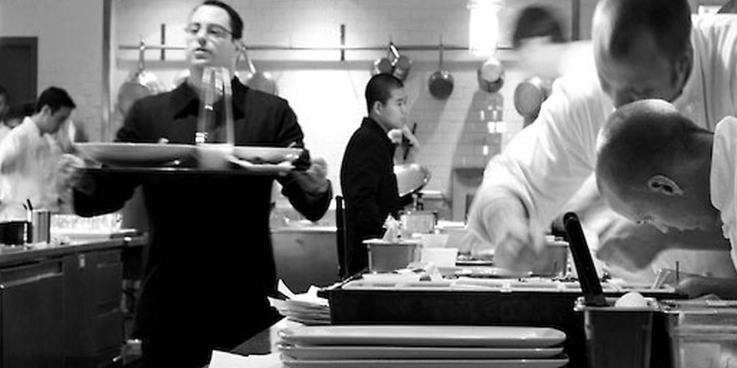 Restaurant service team at work in a kitchen
