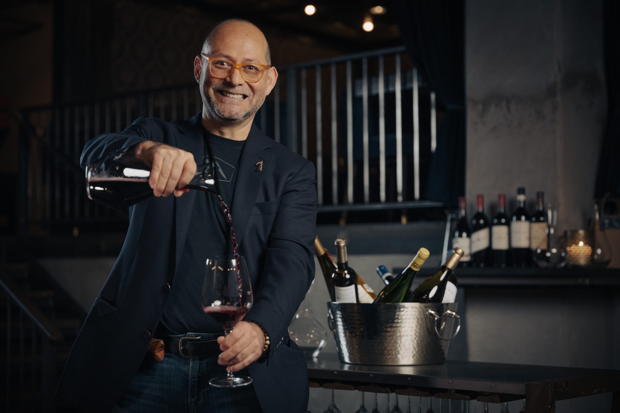 Pablo Aguilar demonstrating attentive wine service