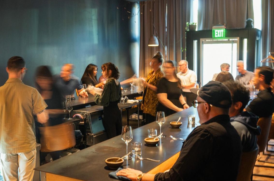 Guests sharing a restaurant table